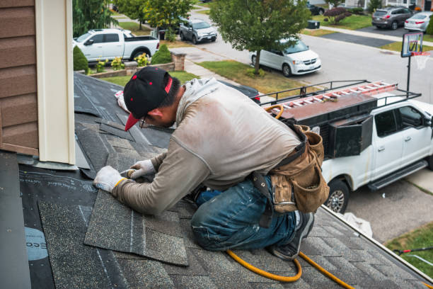 Professional Roofing technician working in Stayton, OR